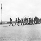 179-RAAF-Flt-Lt-Peck-Salutes-Armistice-Day-11-11-56-Penang.jpg